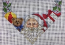 GE669 - Santa With Toys Stocking Topper